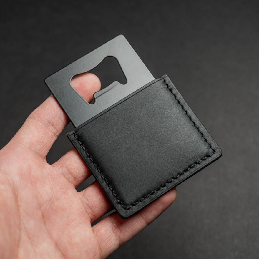 black leather bottle opener